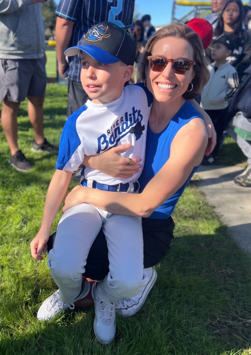 Lindsey with her son Eamon at a Little League game